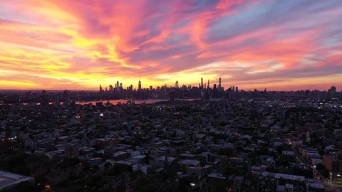 Manhattan Skyline at Sunset Beyond Brooklyn Rooftops Stock-Footage 112365841