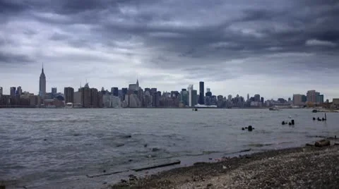 Manhattan Skyline Time Lapse from Beach 库存影片 10736116