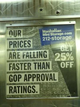 Manhattan Storage Ad poster inside a subway station. Stock Photos