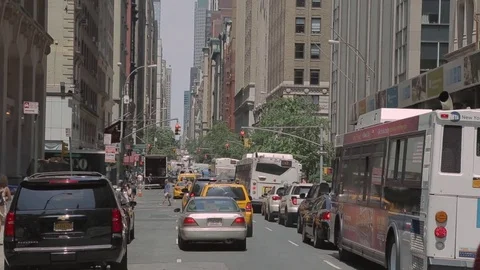 Manhattan street perspective view. Heavy traffic along the way. New York. Stock Footage 75282988