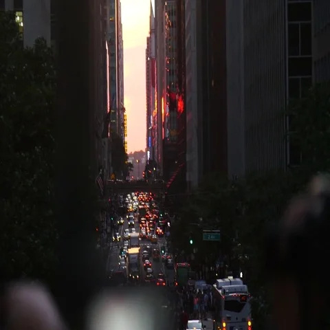 Manhattanhenge - Crowd and Traffic Stock Footage 69628524