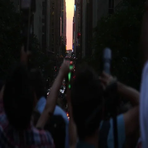 Manhattanhenge - Crowd and Traffic Stock Footage 69629150
