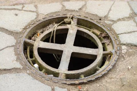 Manhole cover composition as a background Stock Photos