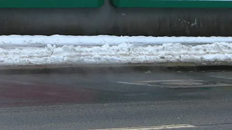 Manhole cover drainage cover with winter steam Stock Footage