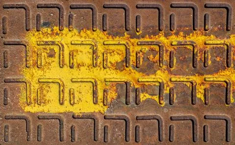 Manhole cover Relief pattern of rusty manhole cover in closeup with rust s... Stock Photos