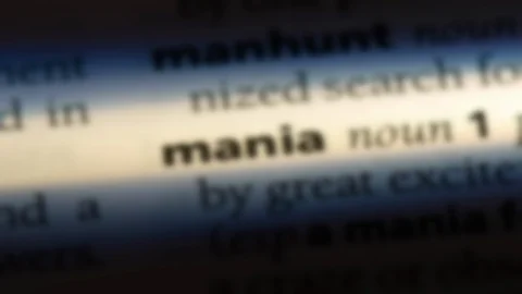 Mania word in a dictionary. Stock Footage 99563333