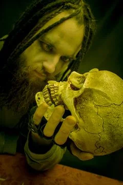 Maniac with skull Stock Photos