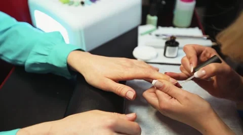 Manicure. Base coat nail closeup Vidéo 60597401