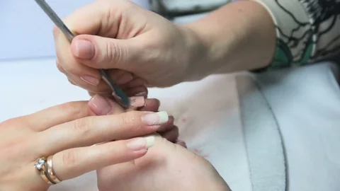 Manicure. Close-up. Remove old nail polish. Slow Motion Stock Footage 70668997