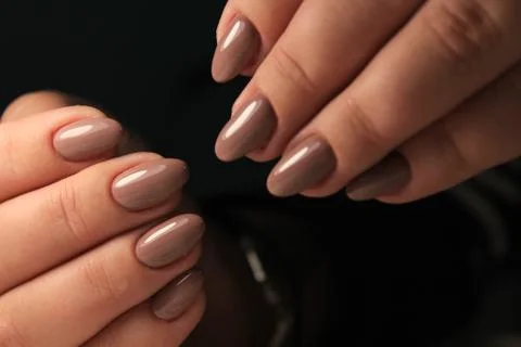 Manicure design nails varnish changes color. Termo Stock Photos