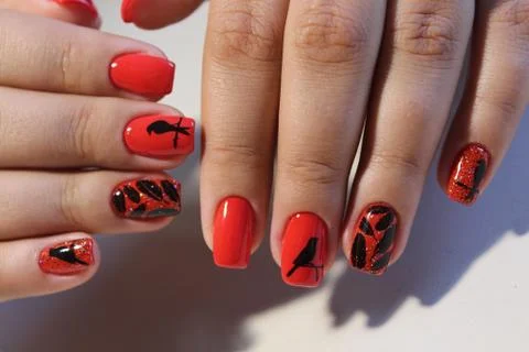 Manicure design red nails with pattern Stockfoto's