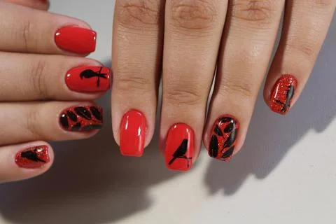 Manicure design red nails Stock Photos