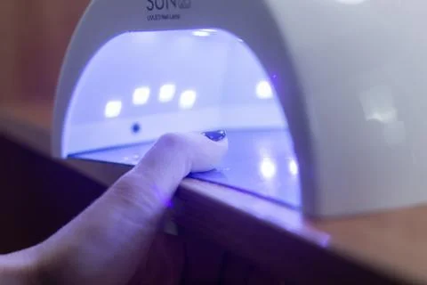 Manicure device for drying nails with ultraviolet, technique Stock Photos