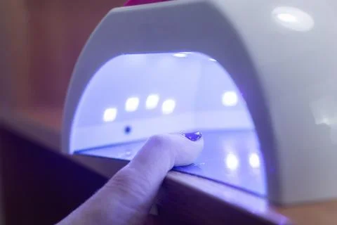 Manicure device for drying nails with ultraviolet, technique Stock Photos
