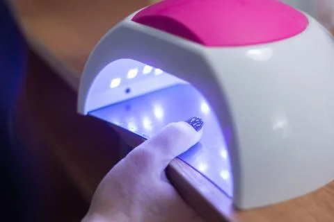 Manicure device for drying nails with ultraviolet, technique Stock Photos