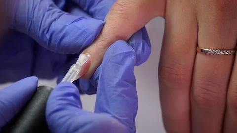 Manicure gel polish first layer Stock Footage 103830822