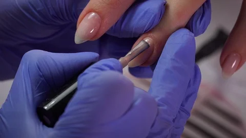 Manicure gel polish first layer with a small brush Video stock 103830858