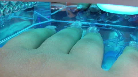 Manicure making, applying nail polish and drying a nails in industrial oven Stock Footage 68821054