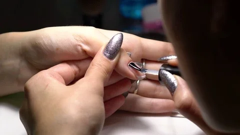 The manicure master does nails. close-up shot Video stock 82878969