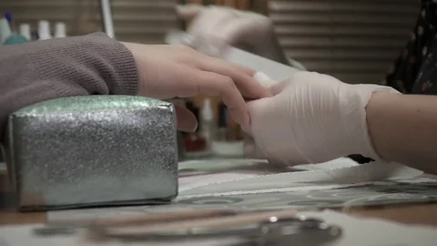 Manicure master working with the customer's hands Stock Footage 73421468