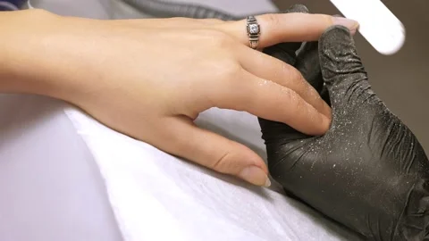Manicure process. Correction of female nails Stock Footage 148965252