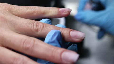 Manicure Process with Nail Brush and Gel Application, Closeup of professional ma Stock Footage 313229083