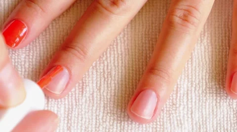 Manicure Process. Nail Polish Applying to Hand, Polish in Coral Color. Stock Footage 40010488