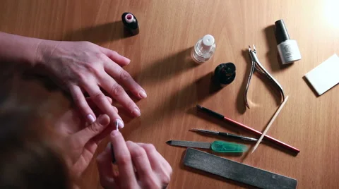 Manicure Process. Nail Polish Applying to Hand Stock Footage 65419301