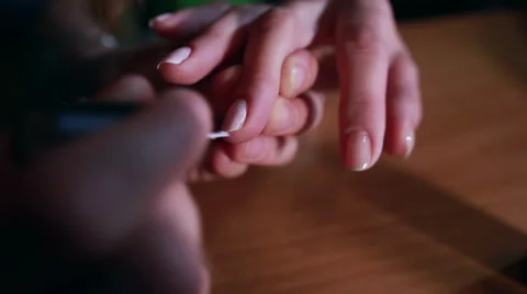Manicure Process. Nail Polish Applying to Hand Stock Footage 65498302