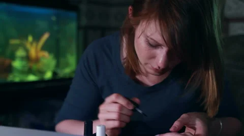 Manicure Process. Nail Polish Applying to Hand Stock Footage 65498701