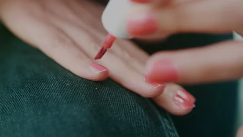 Manicure Process Nail Polish Applying To Girl Hand Using Polish In Pink Color Stock Footage 131095499