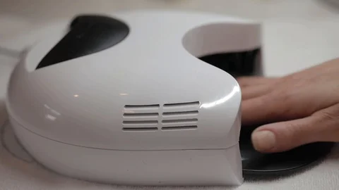 Manicure process. Nails. Infrared light Stock Footage 96052238