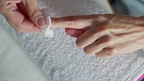 Manicure removal of the dispersion layer with a cleaner Stock Footage 201485785