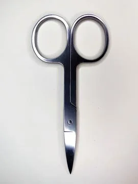 Manicure scissors close-up, isolate on white background Stock Photos