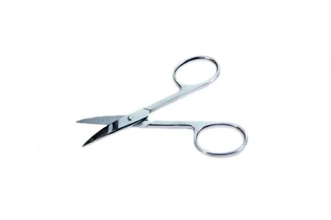 Manicure scissors on a white background close up view Stock Photos