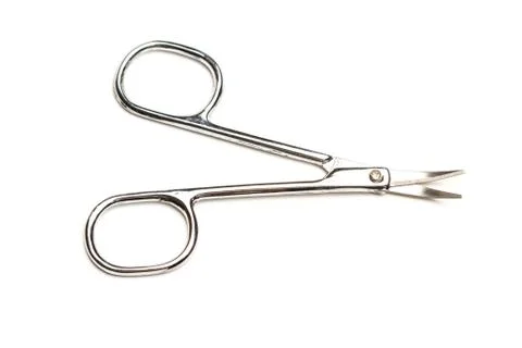Manicure scissors on a white background Stock Photos