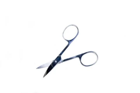 Manicure scissors on a white background viewed from above Stock Photos