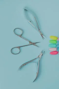 Manicure tools on a blue background Stock Photos