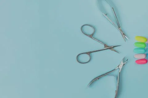 Manicure tools on a blue background Stock Photos