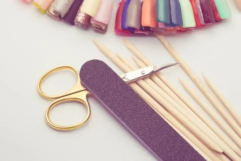 Manicure tools on a white background. Scissors, nail file, sticks, etc. 스톡 사진