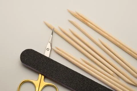 Manicure tools on a white background. Scissors, nail file, sticks, etc. Foto stock