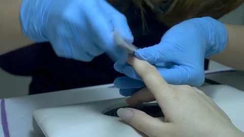 Manicure trims nails file 스톡 동영상 129092404