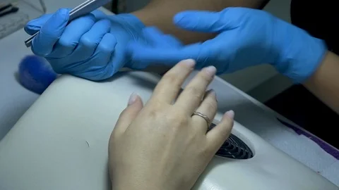 Manicure trims nails - slow motion 스톡 동영상 129092542