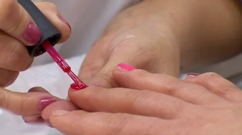 Manicurist Covers Nails With Red Nail Polish Stock Footage 59576277