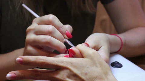 Manicurist creating a gradient with a brush Stock Footage 111668133