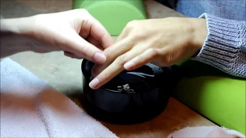 The manicurist prepares the hands of the client's client Stock Footage 74547857