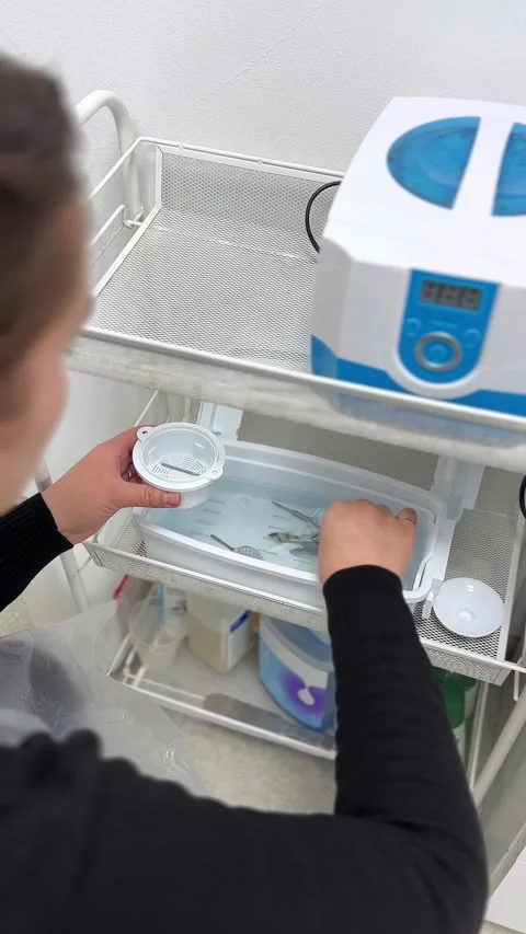 ManicuristUsingElectricNailFile2 Stock Footage 323853078