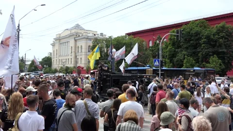 Manifestators, rebels surrounded the podium and listen to the leader-speaker. Stock Footage 134332291