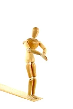 Manikin on a diving board Stock Photos