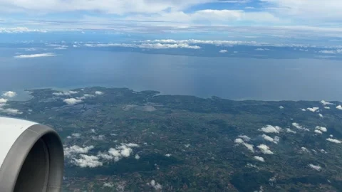 Manila to Boracay flight plane window view POV Philippines Southeast Asia travel Stock Footage 340544163